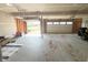 Spacious two-car garage offering ample room for parking and storage with natural lighting at 2358 S Stonehill Way, New Palestine, IN 46163