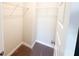 Practical walk-in closet offers efficient storage with installed shelving at 2358 S Stonehill Way, New Palestine, IN 46163