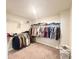 Spacious walk-in closet with organized shelving and ample hanging space for clothing and accessories at 2358 S Stonehill Way, New Palestine, IN 46163