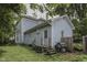Backyard with a grill, deck and view of the home's exterior at 250 N Home Ave, Franklin, IN 46131