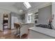 Modern kitchen features stainless steel appliances, center island, and skylight at 250 N Home Ave, Franklin, IN 46131