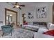 Comfortable living room with large sectional couch, area rug, and hardwood floors at 250 N Home Ave, Franklin, IN 46131