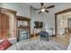 Cozy living room with decorative fireplace, wooden mantel, and hardwood floors at 250 N Home Ave, Franklin, IN 46131