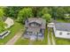 Aerial view of a well-maintained home featuring a new roof, dark trim, and a charming front porch at 2720 S Taft Ave, Indianapolis, IN 46241