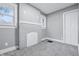Bedroom featuring neutral tones, a decorative fireplace, and ample natural light at 2720 S Taft Ave, Indianapolis, IN 46241
