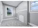 Bedroom featuring neutral tones, a decorative fireplace, and ample natural light at 2720 S Taft Ave, Indianapolis, IN 46241