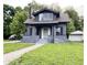 Charming gray two-story home with a well-maintained lawn and front walkway at 2720 S Taft Ave, Indianapolis, IN 46241
