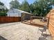 Backyard featuring a patio, wooden deck, and fenced yard at 302 Penn St, Westfield, IN 46074
