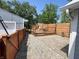 Backyard featuring a patio, wooden deck, and fenced yard at 302 Penn St, Westfield, IN 46074