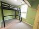Bright bedroom with a bunk bed, large window and neutral carpet at 302 Penn St, Westfield, IN 46074