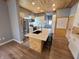 Well-appointed kitchen featuring a center island, modern appliances, and ample cabinet space at 302 Penn St, Westfield, IN 46074