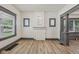Bright living room with a charming decorative fireplace and stylish gray trim at 3028 Hovey St, Indianapolis, IN 46218