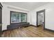 Living room featuring light wood-look flooring and white walls at 3028 Hovey St, Indianapolis, IN 46218