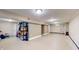 Unfinished basement with concrete floors and exposed ceiling at 311 S 6Th Ave, Beech Grove, IN 46107