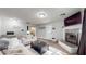Comfortable living room featuring a fireplace, stylish furniture, and ample space for relaxing at 311 S 6Th Ave, Beech Grove, IN 46107