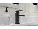 Close-up of modern bathroom vanity with a sleek matte black faucet at 3365 Riverside Dr, Columbus, IN 47203