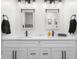 Stylish bathroom featuring double sinks, modern fixtures, and decorative mirrors at 3365 Riverside Dr, Columbus, IN 47203