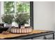 Elegant dresser with rustic-chic décor for a modern touch at 3365 Riverside Dr, Columbus, IN 47203