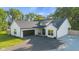 Charming single-Gathering home featuring a two-car garage and a well-manicured front yard at 3365 Riverside Dr, Columbus, IN 47203