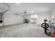 Well-lit garage with ample space, storage, and a window for natural light, providing a functional workspace at 3365 Riverside Dr, Columbus, IN 47203