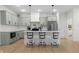Beautiful kitchen featuring sleek countertops, stylish bar stools, and modern pendant lighting at 3365 Riverside Dr, Columbus, IN 47203