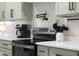Elegant kitchen featuring stainless steel appliances, shaker cabinets and light countertops at 3365 Riverside Dr, Columbus, IN 47203