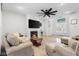 Inviting living room with open layout, modern fireplace, and comfortable seating, perfect for relaxation at 3365 Riverside Dr, Columbus, IN 47203