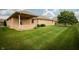 Large, well-maintained backyard with expansive grassy area and mature trees at 3717 Bellmore Dr, Brownsburg, IN 46112