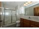 The bathroom has granite counters and a walk-in shower at 3717 Bellmore Dr, Brownsburg, IN 46112
