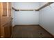Spacious walk-in closet featuring ample shelving and hanging space at 3717 Bellmore Dr, Brownsburg, IN 46112