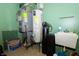 Utility room with modern appliances, sink, and plenty of room for storage at 3717 Bellmore Dr, Brownsburg, IN 46112