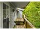 Exterior wooden deck with a view of lush greenery at 379 N Marion St, Morgantown, IN 46160