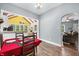 View of open dining room, hardwood floors, and open kitchen area at 379 N Marion St, Morgantown, IN 46160