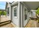 Home exterior featuring a wooden deck and natural light at 379 N Marion St, Morgantown, IN 46160