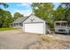 Charming garage with unique star detail and ample parking space at 379 N Marion St, Morgantown, IN 46160