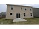 View of the backyard highlighting the exterior of the home at 3917 Highcrest Rd, Indianapolis, IN 46239