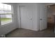 Bedroom featuring soft carpet, closet and natural light at 3917 Highcrest Rd, Indianapolis, IN 46239