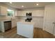Modern kitchen featuring stainless appliances, bright countertops, and an island at 3917 Highcrest Rd, Indianapolis, IN 46239