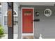 Close-up of the home's address and vibrant red front door at 422 W Broadway St, Greenwood, IN 46142