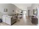 Open-concept living room with kitchen view, ideal for entertaining at 422 W Broadway St, Greenwood, IN 46142