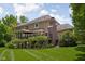Beautiful backyard with a well-maintained lawn and inviting outdoor deck at 4529 Panthera Leo Dr, Carmel, IN 46074