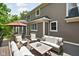 Spacious deck with ample seating and umbrella, ideal for entertaining and relaxation at 4529 Panthera Leo Dr, Carmel, IN 46074