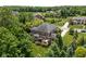 Enjoy a stunning outdoor space and mature trees surrounding the beautifully landscaped backyard at 4529 Panthera Leo Dr, Carmel, IN 46074
