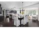 Open concept kitchen and sunroom area with lots of room for entertaining at 4529 Panthera Leo Dr, Carmel, IN 46074