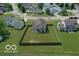 Aerial view of a fenced backyard, providing privacy and ample space for outdoor activities at 4605 Clairmont Dr, Columbus, IN 47203