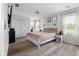 Spacious bedroom with a queen bed, natural light, and closet at 4605 Clairmont Dr, Columbus, IN 47203
