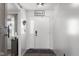 Bright entryway with a stylish rug, a modern light fixture, and a charming decor at 4605 Clairmont Dr, Columbus, IN 47203
