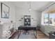 Bright home office featuring modern desk, stylish decor, and ample natural light at 4605 Clairmont Dr, Columbus, IN 47203