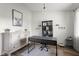 Inviting home office featuring a modern desk, sleek shelving, and a stylish cabinet for an inspiring workspace at 4605 Clairmont Dr, Columbus, IN 47203