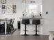 Stylish kitchen island with bar stool seating, modern countertops, and chic decor details at 4605 Clairmont Dr, Columbus, IN 47203
